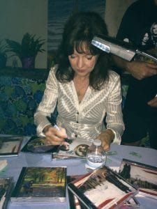 Harriet Schock signing CDs (photo by Kaci Christian)
